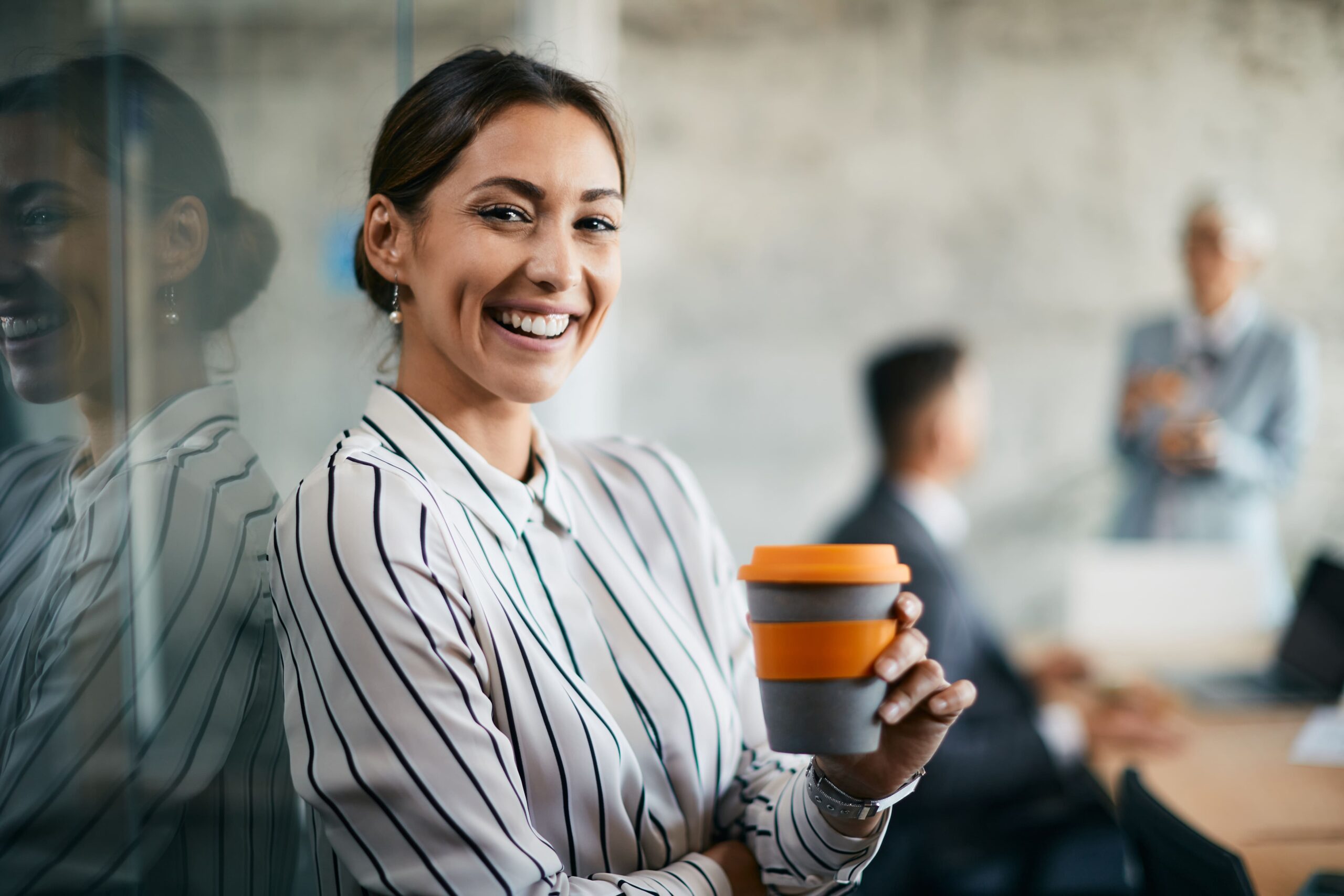 young-happy-businesswoman-enjoying-in-coffee-break-2022-11-23-17-59-37-utc (1)